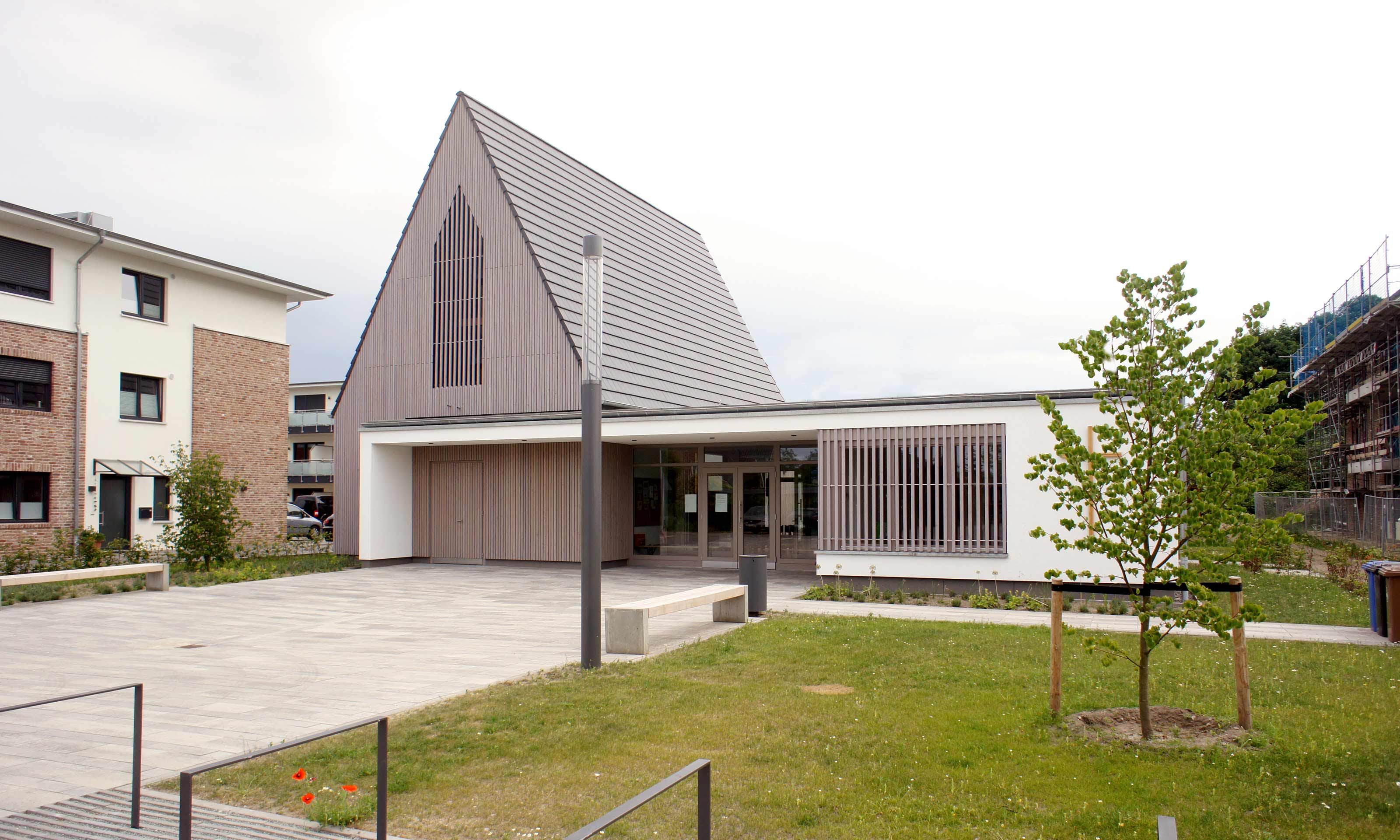 Neubau kirchliches Gemeindezentrum mit Holzbau Fassaden (1.Preis)